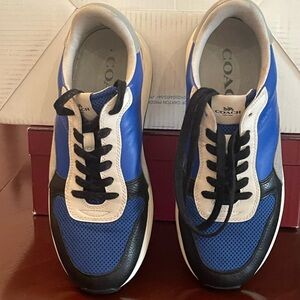 Used Coach men’s blue and white sneakers.